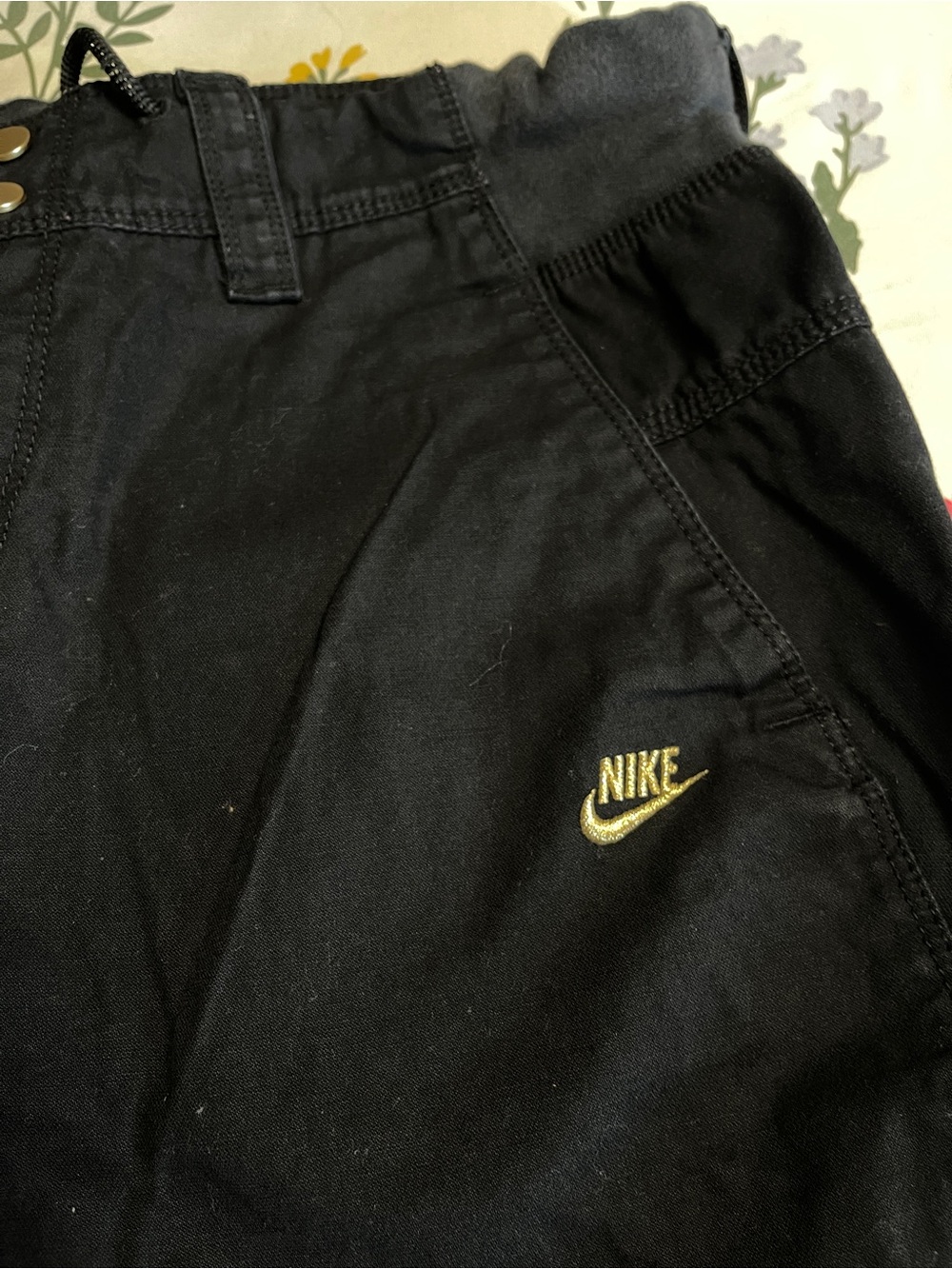 Nike Black Pants with Gold Swoosh Accent